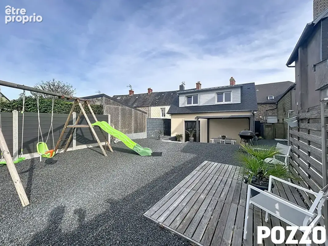 LESSAY - maison de ville avec patio, terrasse et jardin en vente chez POZZO IMMOBILIER. - photo 1