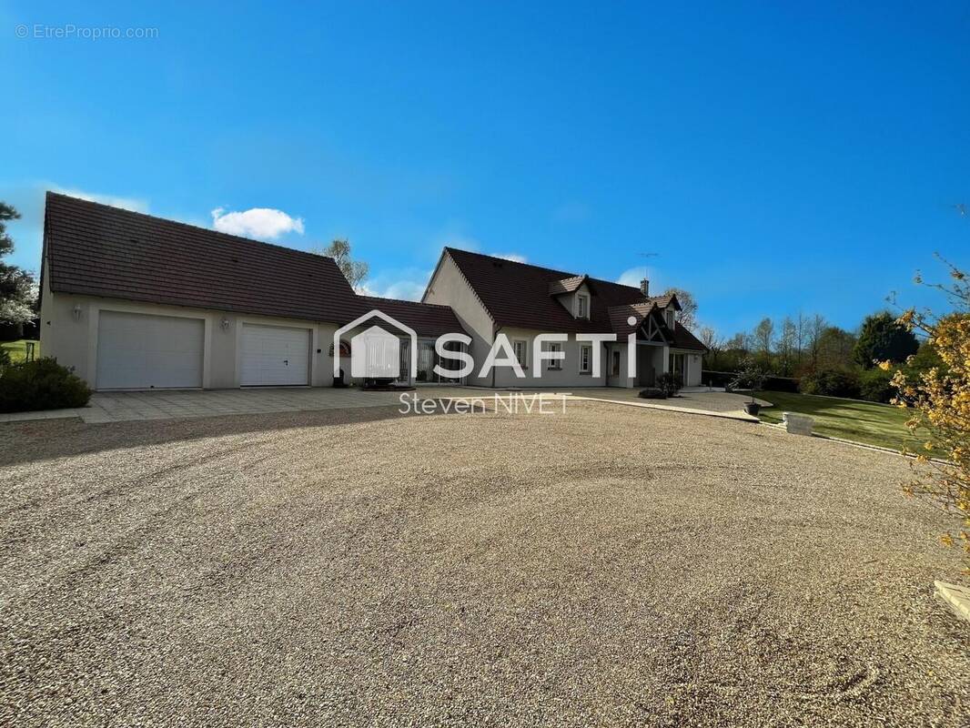Photo 1 - Maison à GENOUILLY