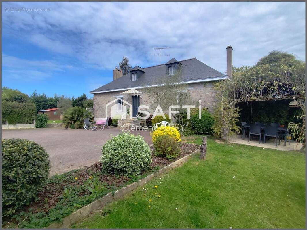 Maison 124 m² à Saint-Ouen-Des-Toits  - photo 2