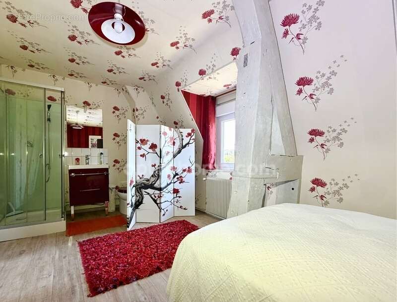 Demeure de caractère du XVIIe siècle rénovée avec élégance – Une adresse rare au cœur de la ville de Bernay (27300) - photo 26