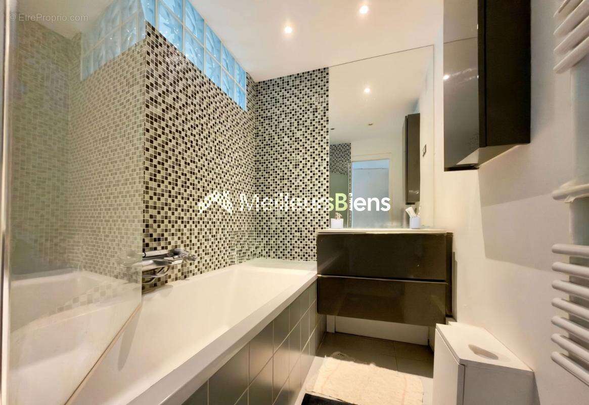 Levallois-Perret 82 m² 4 pièces avec suite parentale et cave - photo 6
