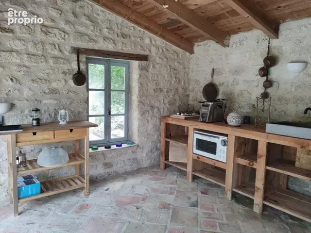 Magnifique maison en pierre avec gîte attenant et 6 575 m2 de terrain arboré - photo 8