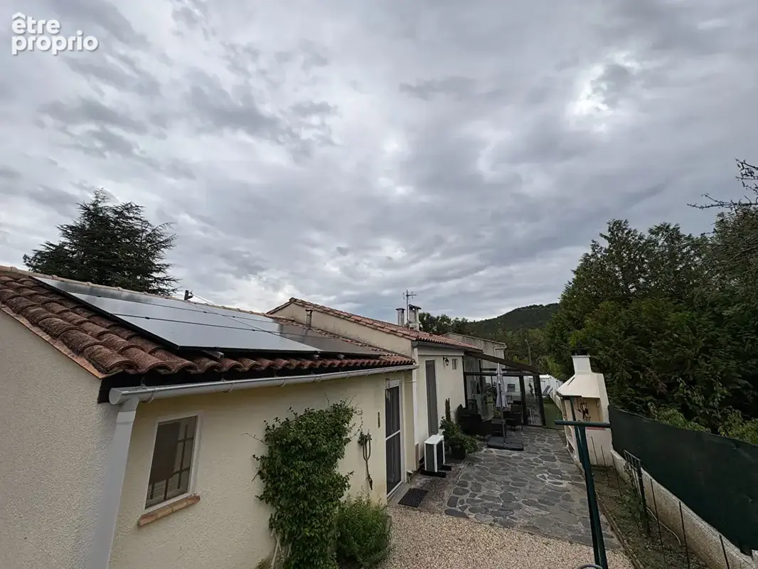 Villa de plain-pied de 100 m² avec piscine, véranda, grand garage et panneaux photovoltaïques à Montazels - photo 8