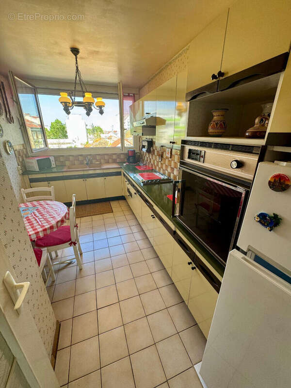Grand 2 pèces 51m² : Parking + Cave - photo 7