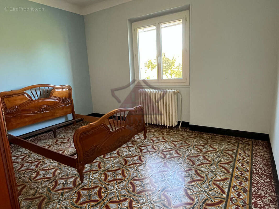 Maison à SAINT-JULIEN-LES-ROSIERS