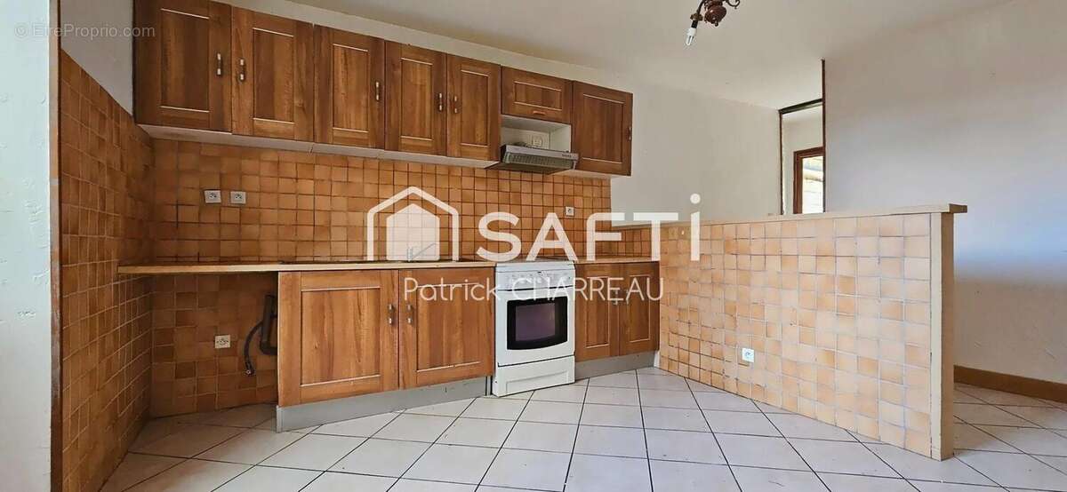 Photo 3 - Maison à TERRASSON-LAVILLEDIEU