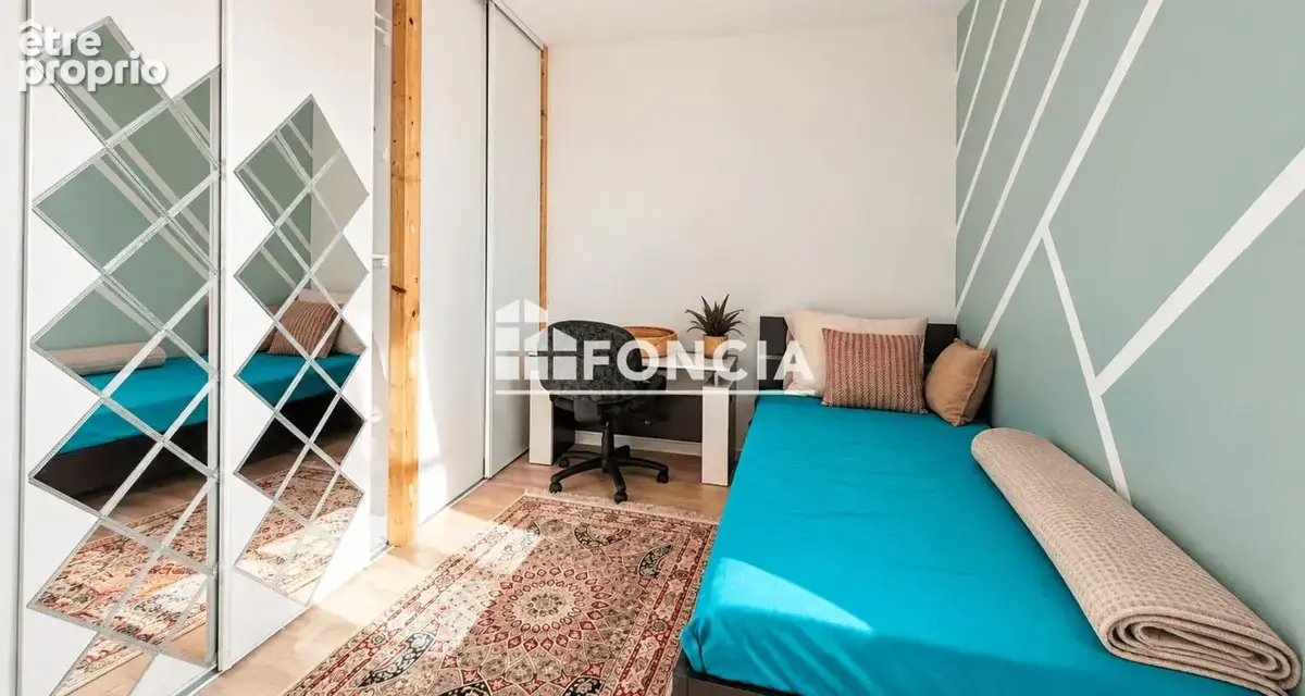 T3 de 66 m² (2020) DPE B : Terrasse, balcon, ascenseur et parking sous-sol - photo 8