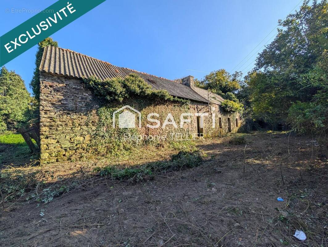 Photo 1 - Terrain à BELLE-ISLE-EN-TERRE