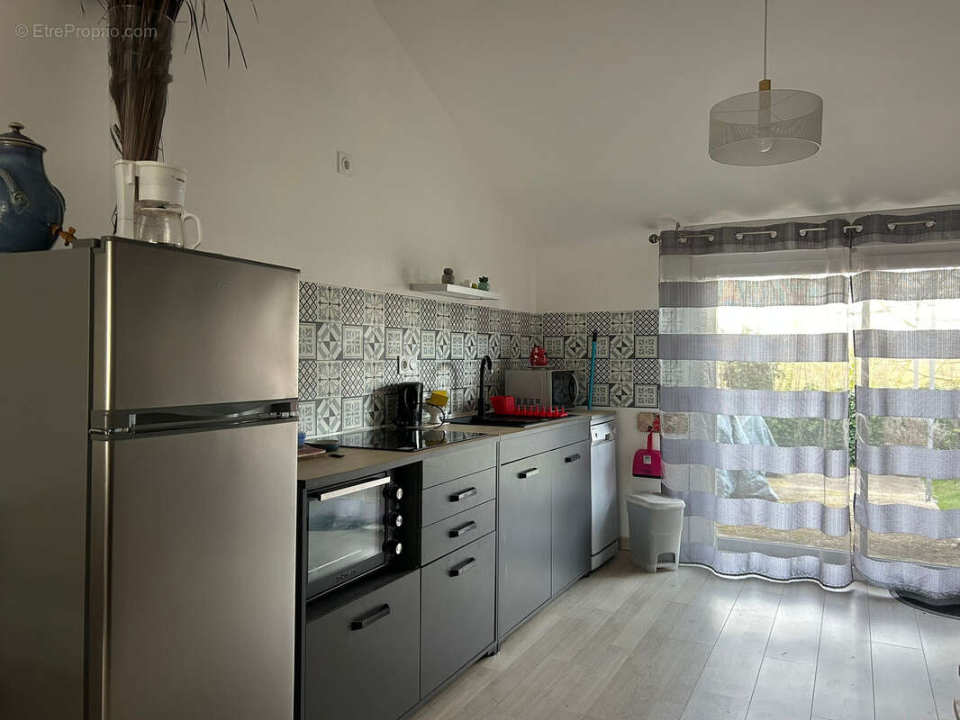 Charmante maison en pierre et son jardin attenant - photo 11