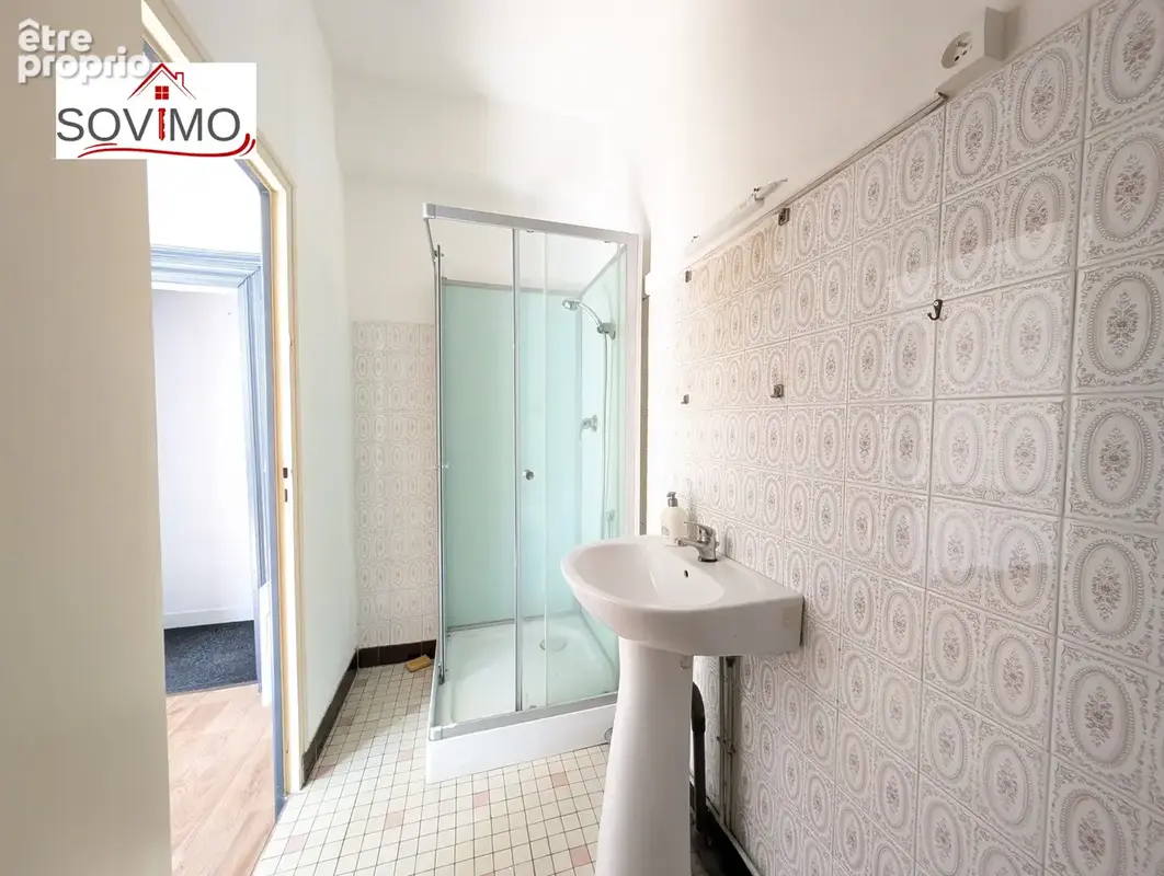 Immeuble a investissement locatif : 2 appts + 1 local commercial - photo 9