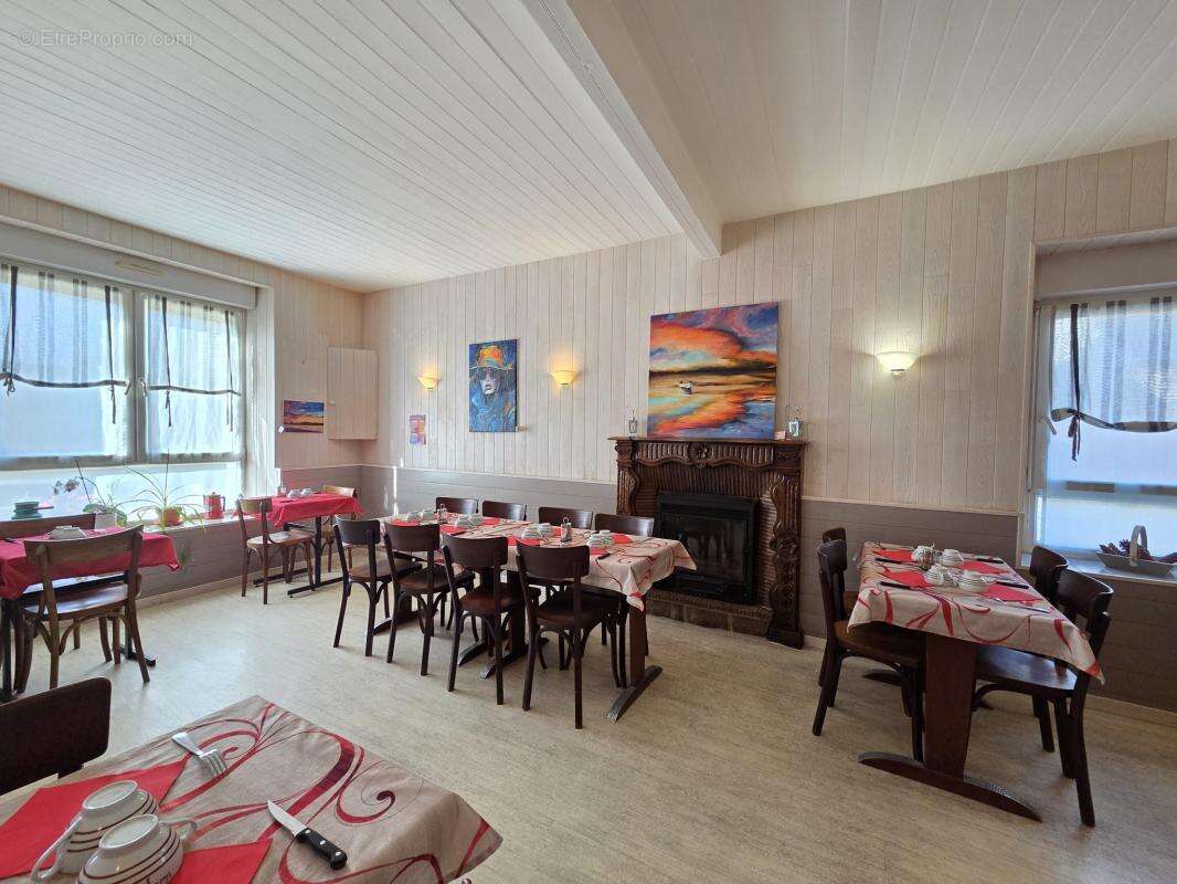 Ensemble immobilier 3 logements-parking- centre bourg neulli - photo 4