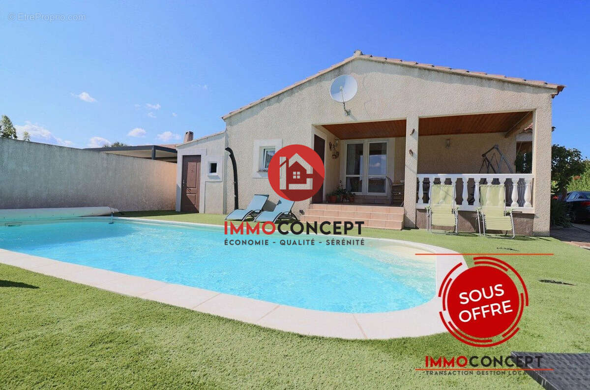 Maison à LAUDUN-L'ARDOISE