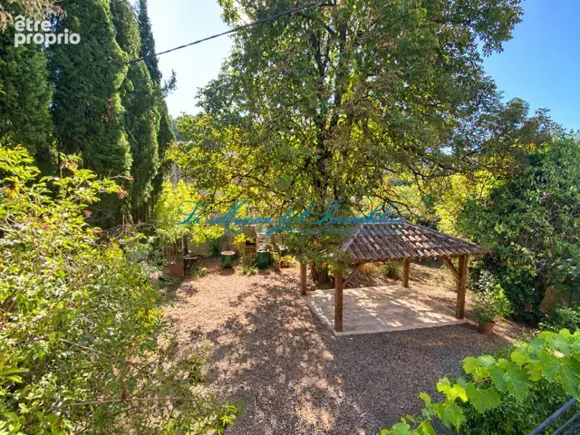 GENERARGUES, Maison de maitre en pierre de 94m2 et un garage de 80 m2, le tout sur 1595 m2 de terrain clos ave - photo 2