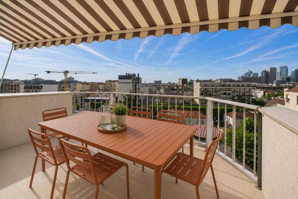 Photo 1 - Appartement à COURBEVOIE