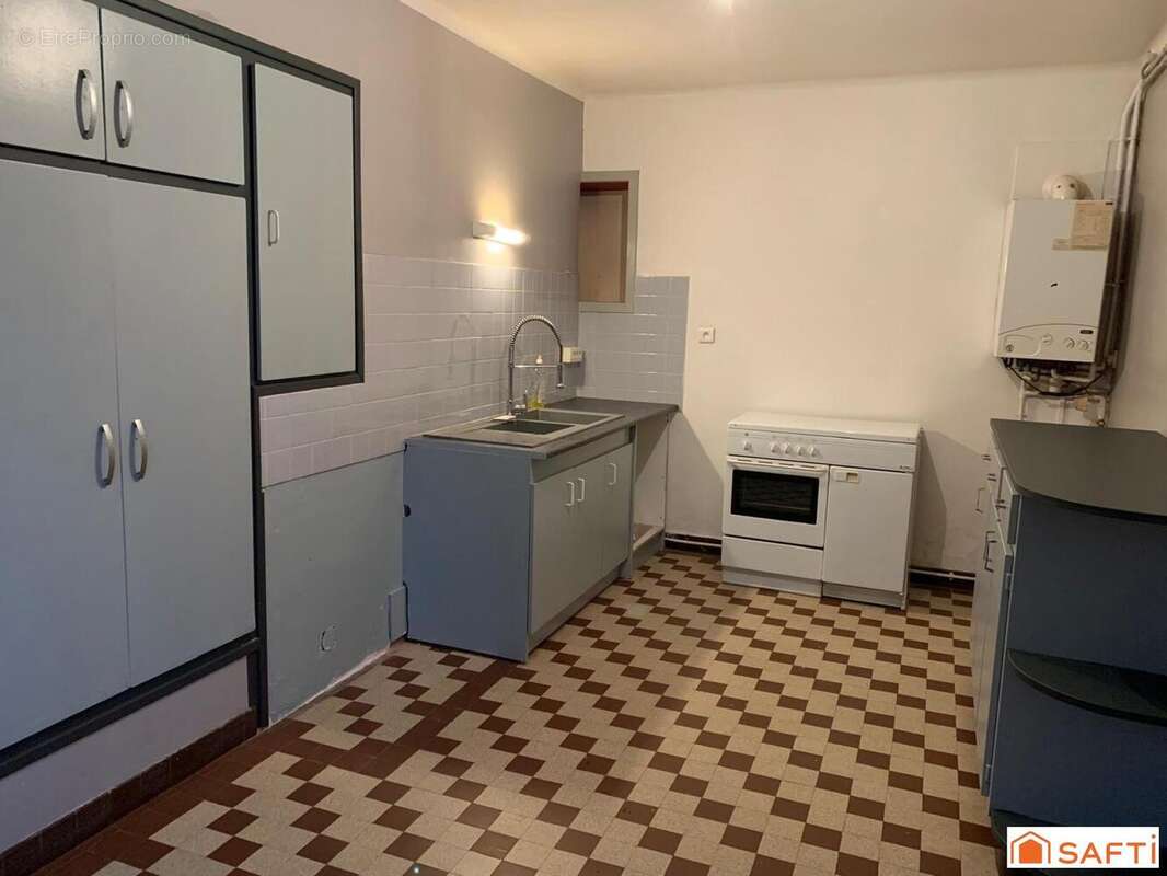 Photo 3 - Maison à CHATEAUNEUF-DU-FAOU