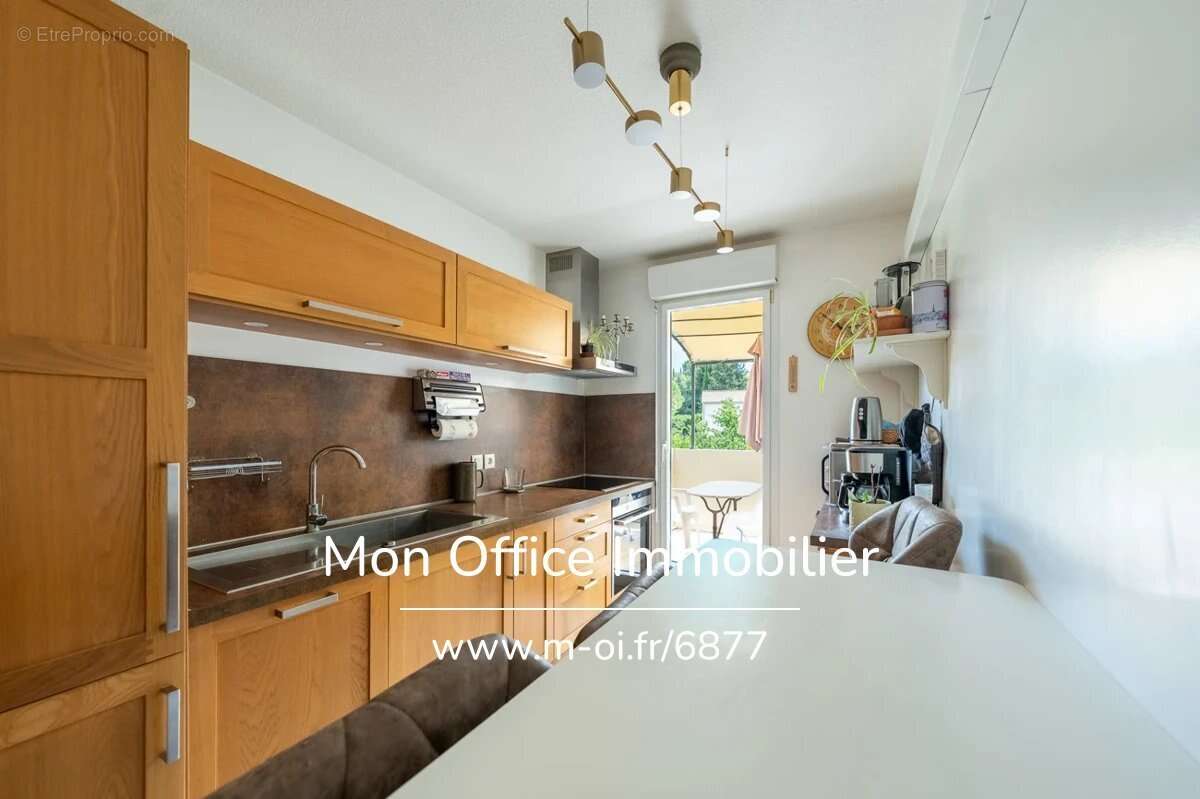 Référence : 6877-PAN. - Appartement 3 pièces de 68 m2 avec terrasse + box - photo 3