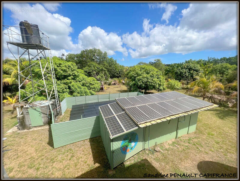 A vendre a kourou (97310 guyane française) une magnifique maison de campagne t4 de 103 m² sur un terrain de 5000 m² - au prix de - photo 6