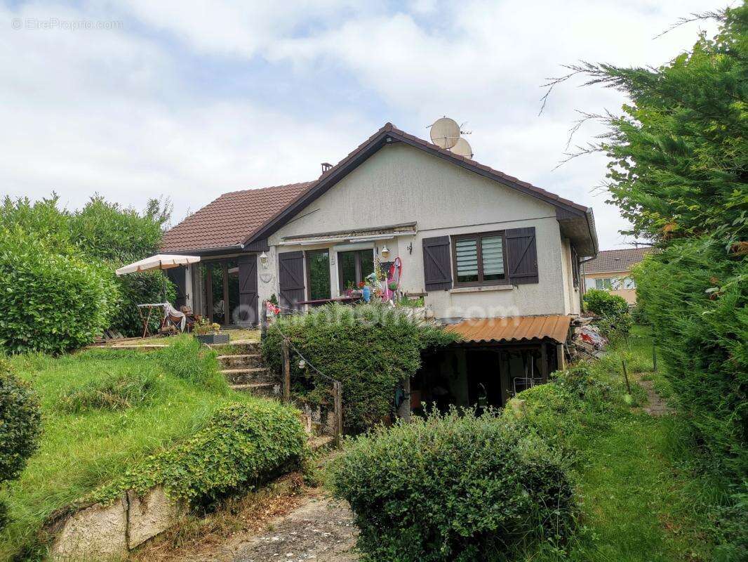 Maison Individuelle terrain 44 ares - photo 9