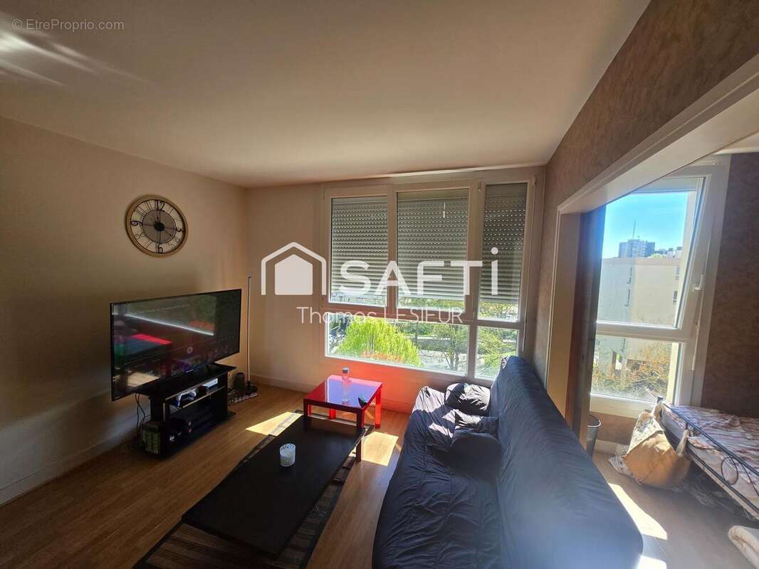 Photo 2 - Appartement à HEROUVILLE-SAINT-CLAIR