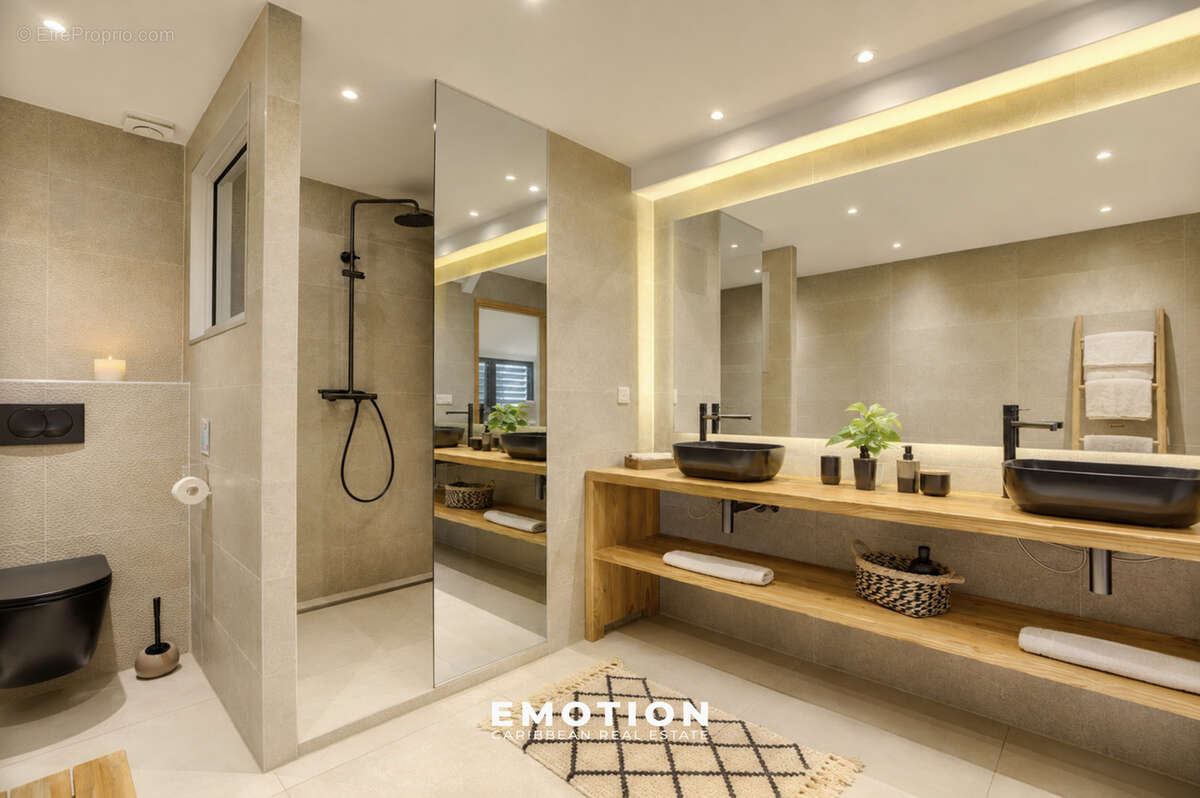 Duplex 140m2 - T3 - Vue marina Anse Marcel - photo 13