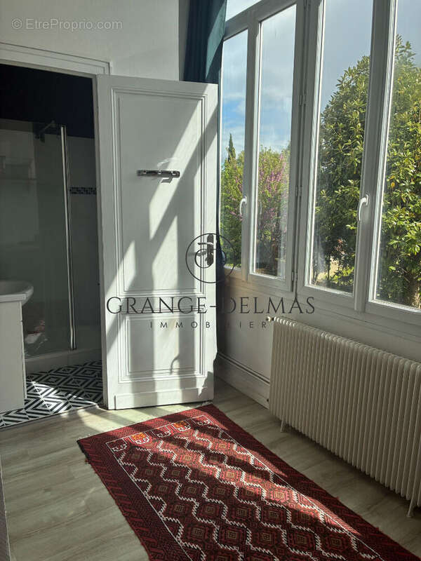 Appartement 1er étage - immeuble pierre - SAINT SEURIN - photo 10