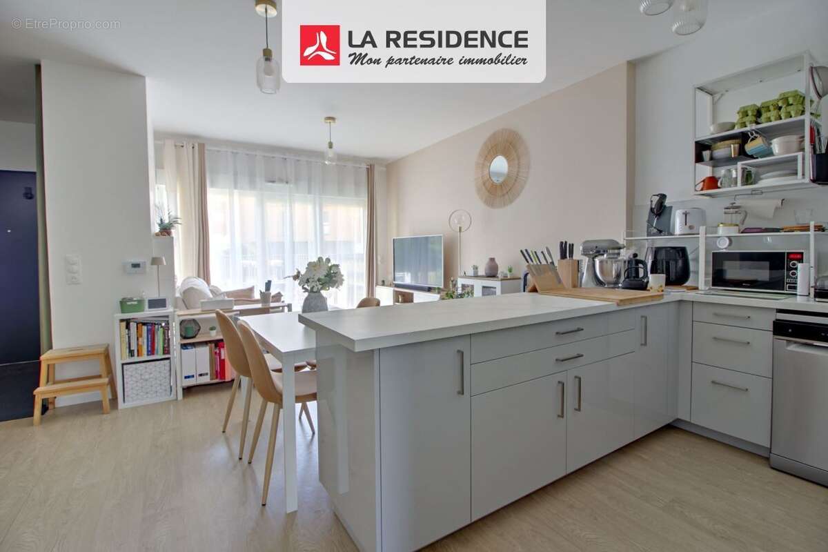 Appartement 62 m² à Mont-Saint-Aignan  - photo 4