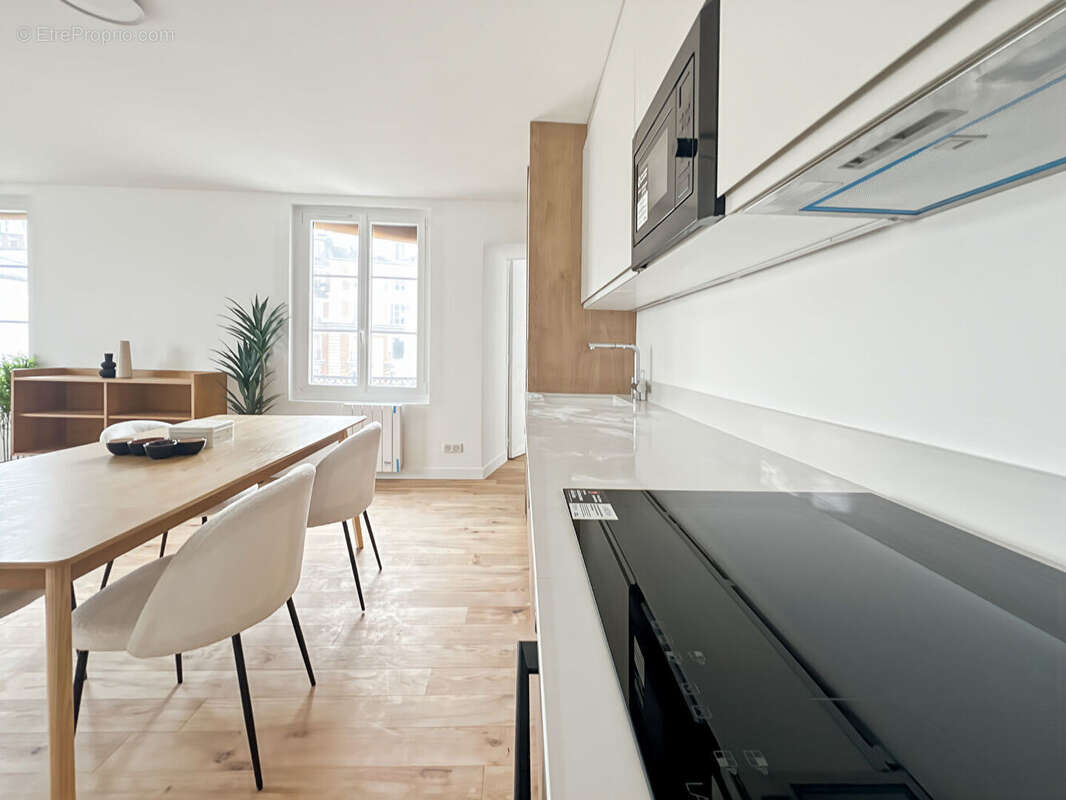 Appartement Paris 4 pièce(s) 91 m2 - photo 5