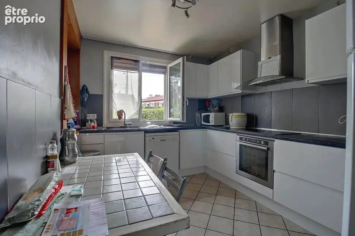 Maison 6 pièces 132 m² à vendre à Saint-Etienne-Du-Rouvray (76800) - photo 4