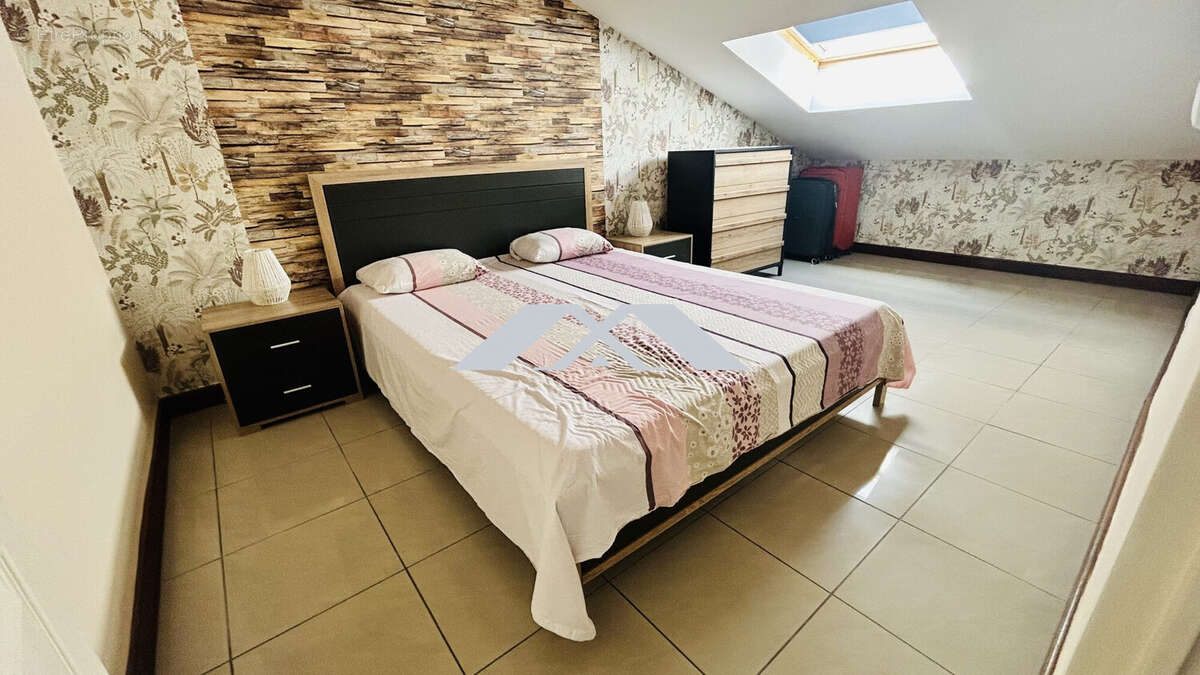 CHAMBRE 2 - Appartement à LA POSSESSION