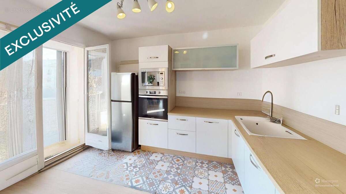 Photo 3 - Appartement à DECINES-CHARPIEU