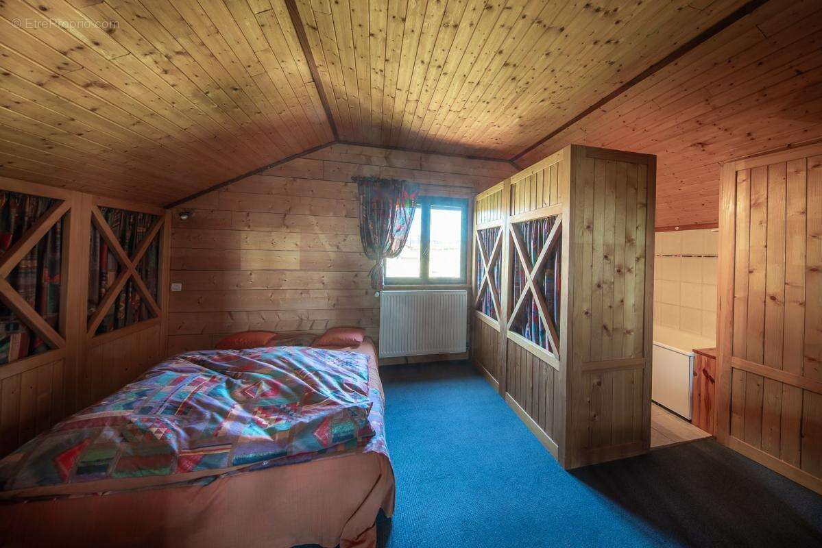HURIGNY – Chalet suisse d'exception de 110m² sur 2 400 m² de terrain sans vis-à-vis – Fort potentiel de rénovation ! - photo 19