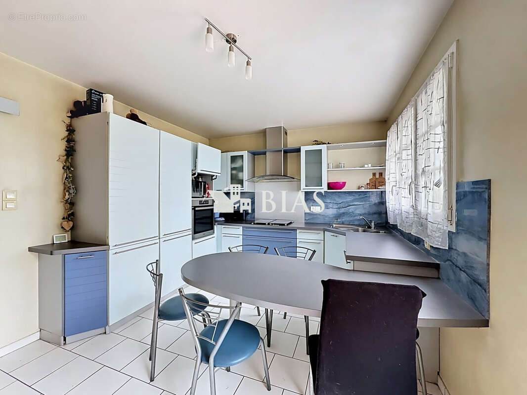 Maison 109 m² à Bourg-Achard  - photo 7