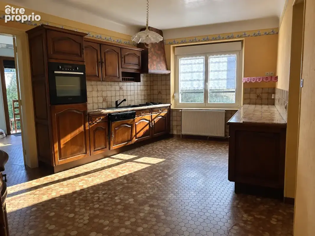 À deux pas du centre de Commercy : Appartement type T3 avec garage et dépendance - photo 3