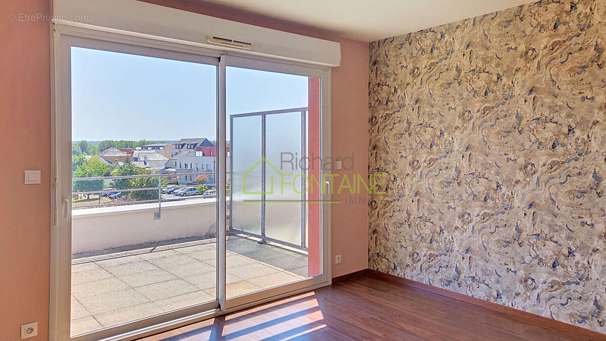 Appartement T2 en dernier étage avec grande terrasse et garage femé en sous-sol - photo 6