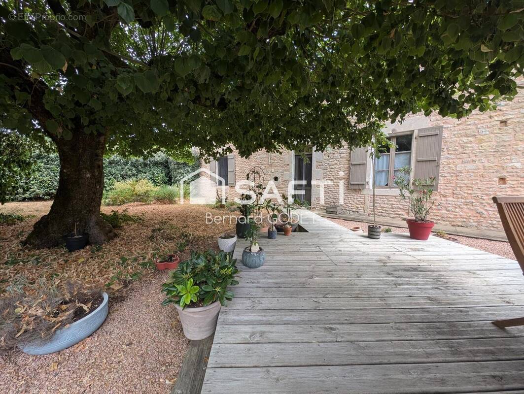 Photo 1 - Maison à LA CHAPELLE-POUILLOUX