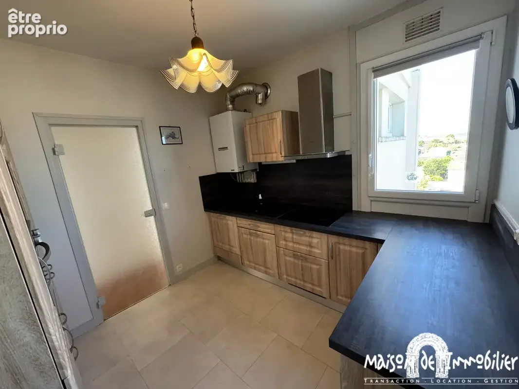 A vendre à COGNAC - Appartement en résidence - 4 pièces - 75m2 - Balcon, garage, parking et cave - photo 4