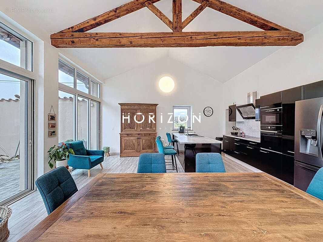 Maison à ROMANECHE-THORINS