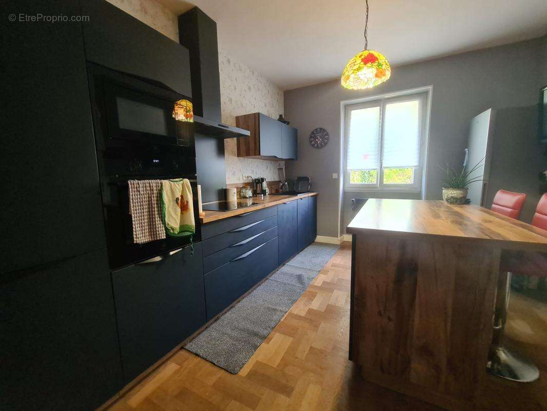 Maison de plain-pied, 5 pièces avec sous-sol total et terrain de 1 134 m² – Châteauneuf-la-Forêt - photo 5