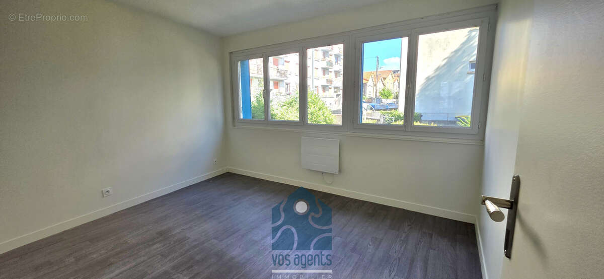 Appartement 3 pièces avec cave et parking privatif - photo 4