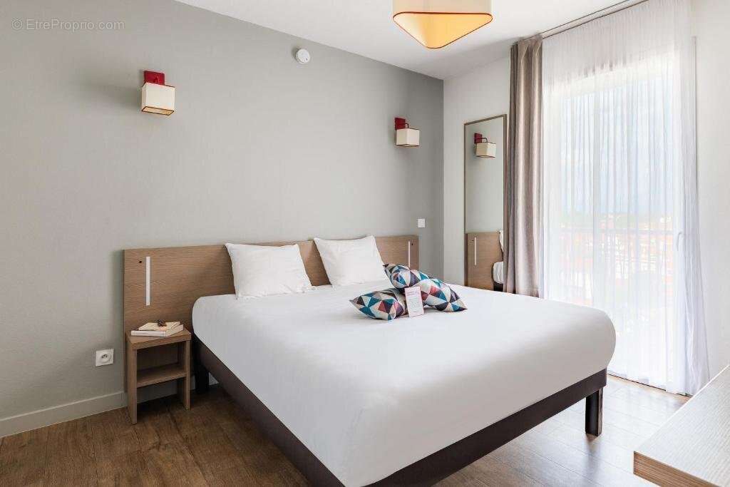INVESTISSEMENT LOCATIF  Perpignan  Résidence de tourisme Appart'City Confort Perpignan Centre Gare - 7.24% de rentabilité - photo 2