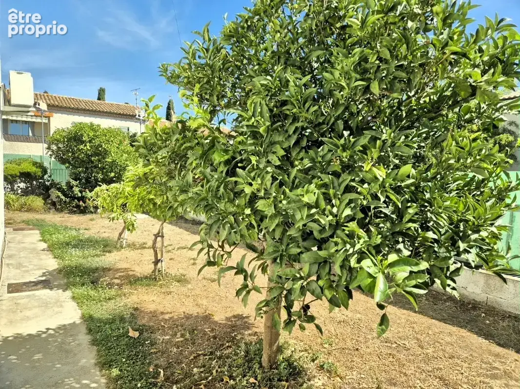 Maison avec garage et jardin en centre-ville - photo 22