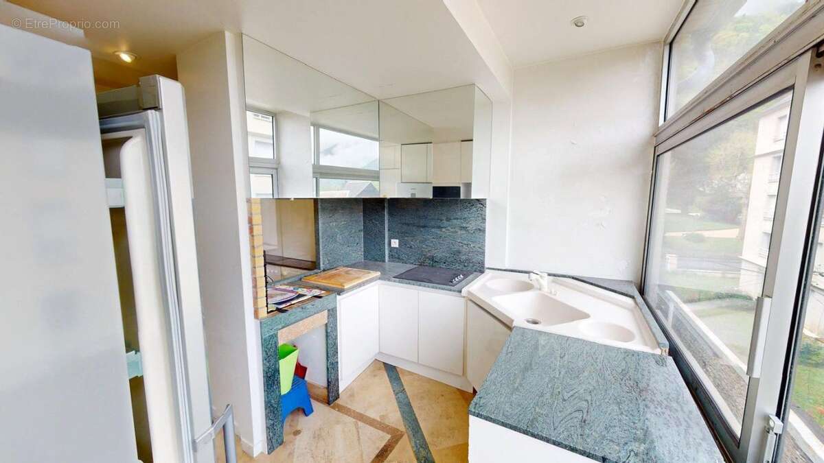 Charmant appartement de type 4 de 112 m² avec Terrasse Plein Sud et Vue Panoramique à Bagnères-de-Luchon - photo 7