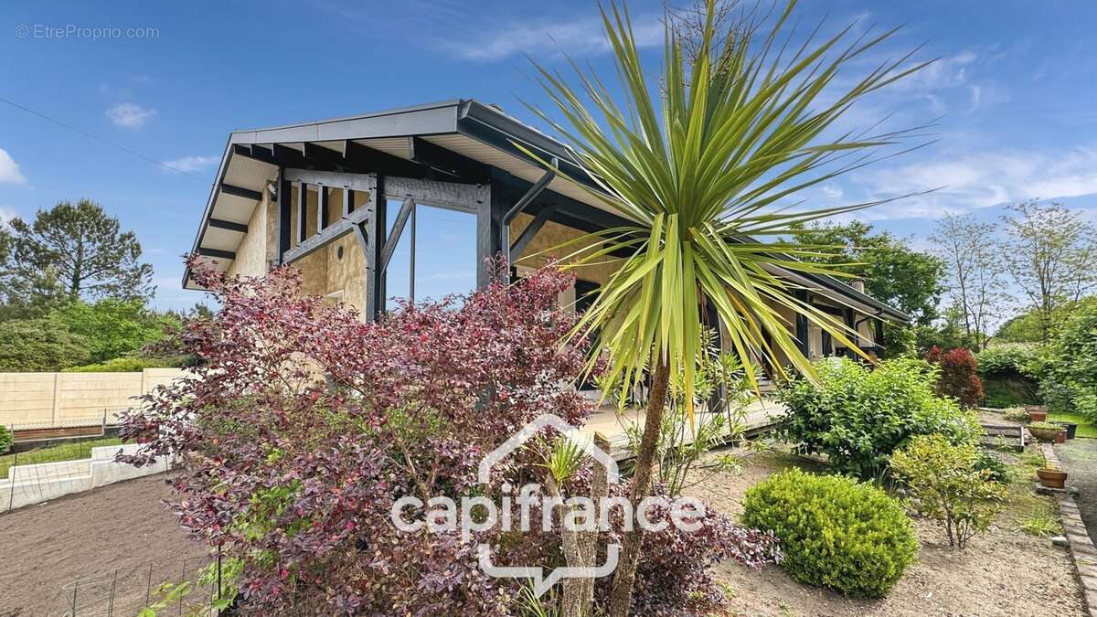 CASTETS 40  – Maison rénovée de 123 m² avec T1 indépendant, sous-sol aménageable de 100 m² et jardin paysagé - photo 11