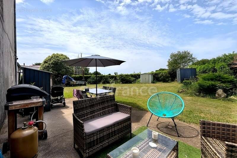 Charmante maison en pierre de 122m², 3 chambres avec jardin, terrasse, cave à GUENGAT(29) - photo 2