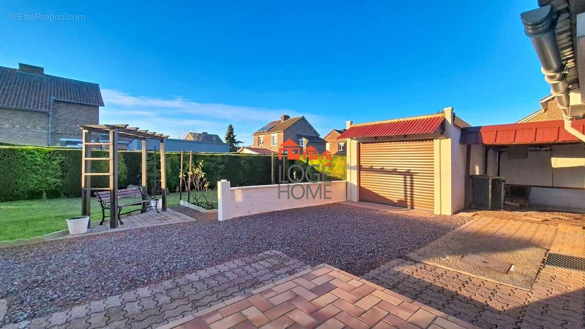 Jardin - Maison à COURCELLES-LES-LENS