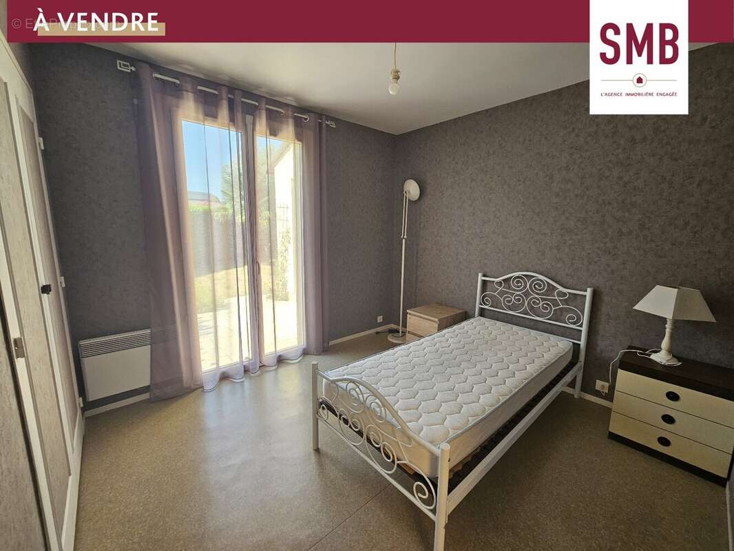 Maison mitoyenne de plain-pied à Lons - photo 6
