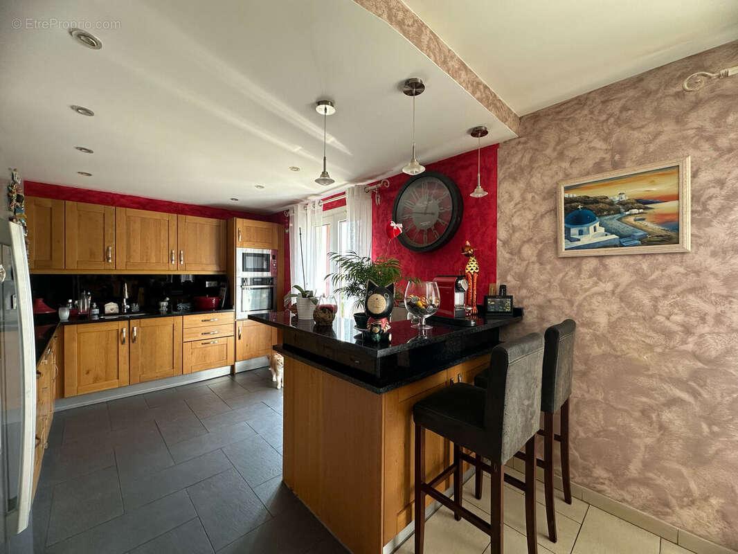 Maison à CHANTELOUP-LES-VIGNES