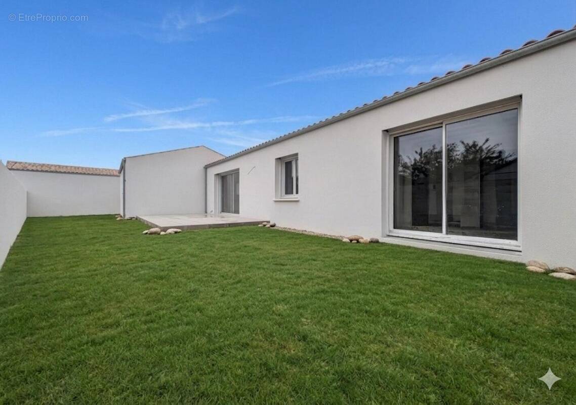 Photo 1 - Maison à PUILBOREAU