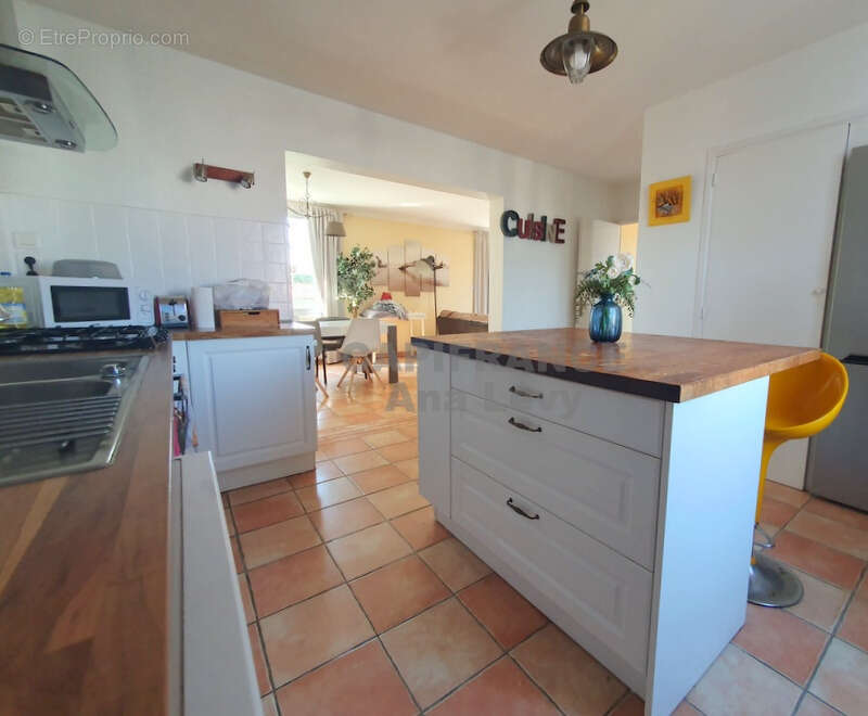 Maison 165m², garage aménagé en studio, parcelle de plus de 1100m² - photo 5