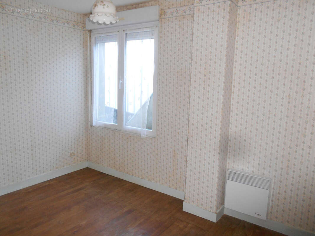 Maison à JUVIGNY-LE-TERTRE